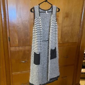 Striped Black and White Sleeveless cardigan.very soft